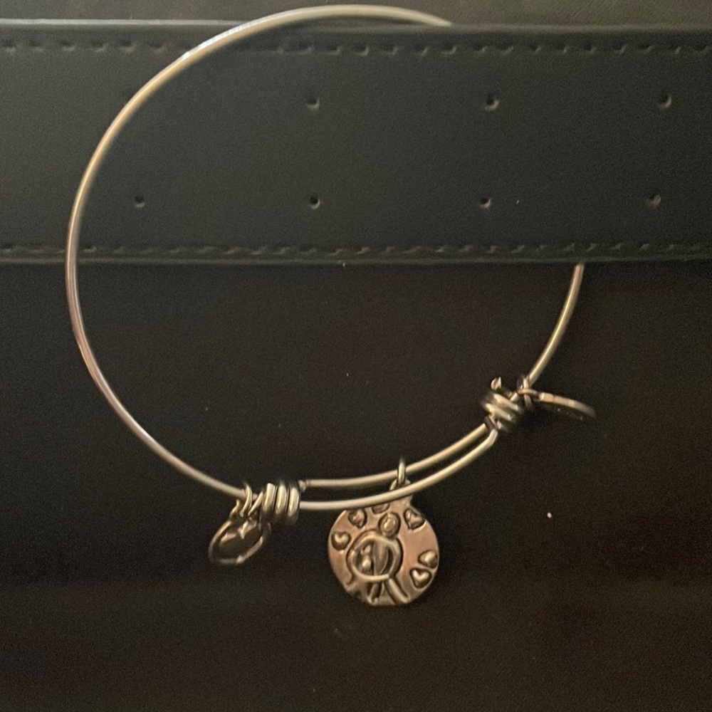Unwritten brand silver tone charm bracelet with mother and child charm